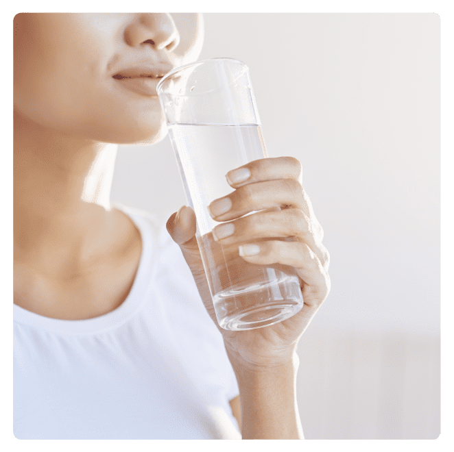 Woman drinking fresh water