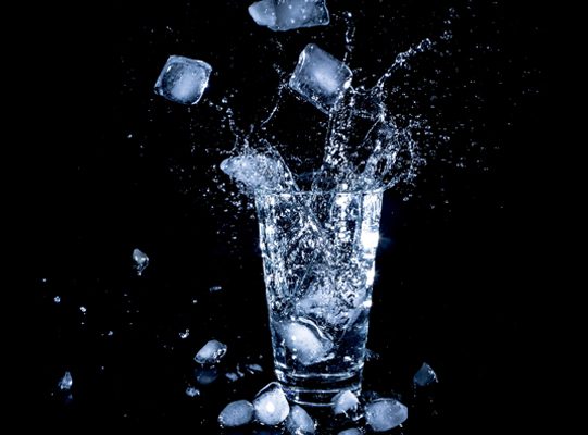 glass of ice water splashing